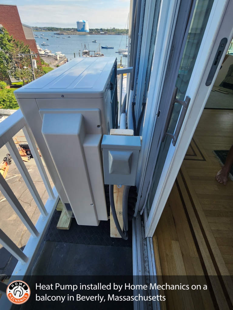 Heat pump installed by Home Mechanics on a Juliet balcony in Beverly Mass